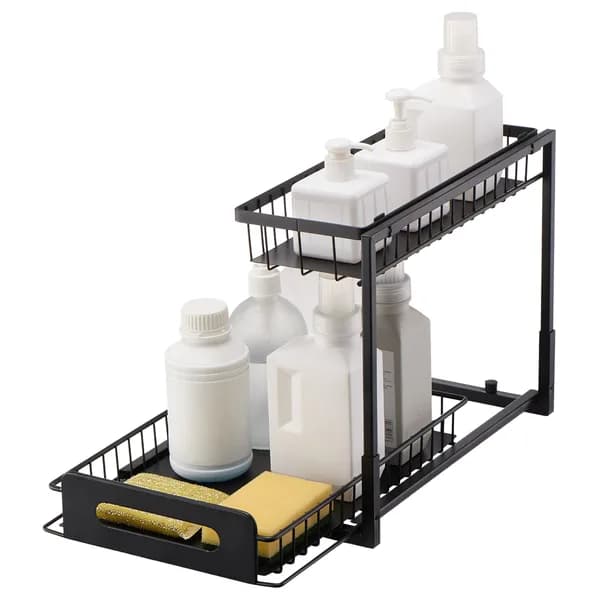 Black two-tier organizer on a white background with the lower basket pulled out, holding white bottles and sponges